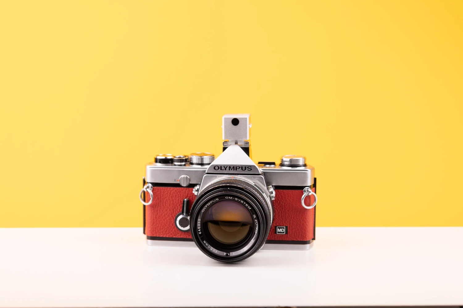 Olympus OM-1 35mm SLR Film Camera With Olympus OM-System G.Zuiko Auto-S 50mm F1.4 Lens In Red 2 Olympus OM-1 35mm SLR Film Camera With Olympus OM-System G.Zuiko Auto-S 50mm F1.4 Lens In Red - Image 2