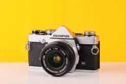 Olympus OM-1n 35mm Film Camera With Olympus Zuiko OM-System MC Auto-W 28mm F2.8 Lens