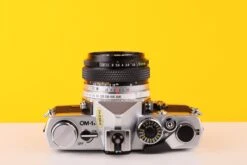 Olympus OM-1n 35mm SLR Film Camera With Zuiko 50mm F1.8 Lens -Photo Camera Gear Store Olympus OM 1n 35mm SLR Film Camera