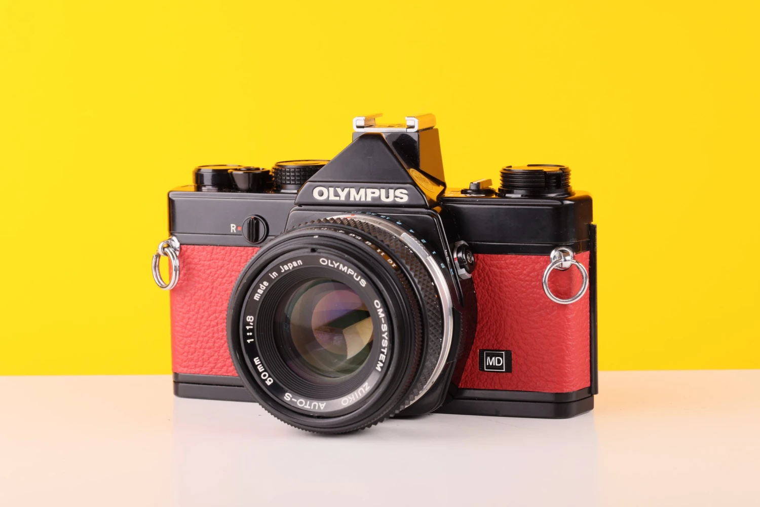 Olympus OM-1n 35mm SLR Film Camera With Zuiko 50mm F1.8 Lens In Red