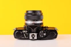 Olympus OM-2n MD Black 35mm Film Camera With Zuiko 50mm F/1.4 Lens -Photo Camera Gear Store Olympus OM 2n MD Black 35mm Film Camera with Zuiko 50mm
