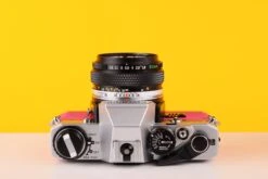 Olympus OM10 35mm SLR Film Camera With Olympus OM-System F.Zuiko Auto-S 50mm F1.8 Lens In Pink -Photo Camera Gear Store Olympus OM10 35mm SLR Film Camera