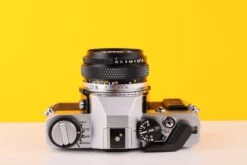 Olympus OM20 35mm SLR Film Camera With Zuiko 50mm F1.8 Lens -Photo Camera Gear Store Olympus OM20 35mm SLR Film Camera 50mm