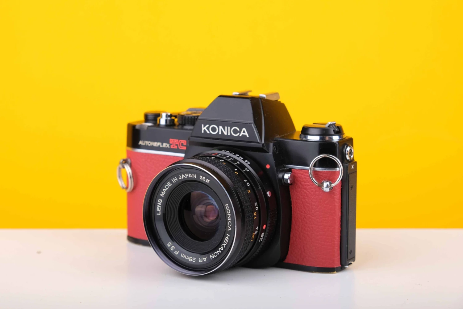 Konica Autoreflex TC 35mm SLR Film Camera With Konica Hexanon AR 28mm F3.5 Prime Lens In Red 1 Konica Autoreflex TC 35mm SLR Film Camera With Konica Hexanon AR 28mm F3.5 Prime Lens In Red