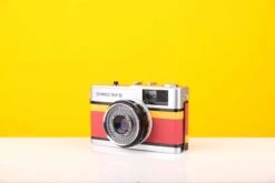 Olympus Trip 35 Vintage 35mm Film Camera In Red And Yellow Leather Skin