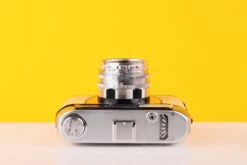 Halina Paulette Electric 35mm Viewfinder Film Camera With Halinar 45mm F2.8 F.C. Lens In Light Yellow -Photo Camera Gear Store vintage camera hut camera